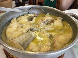 Eat traditional meals like this suquet (fish stew)