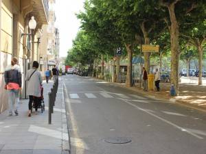 Go down this road, with the Passeig to your right and shops to the left