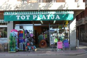 On your left across the road is Tot Platja for water toys etc