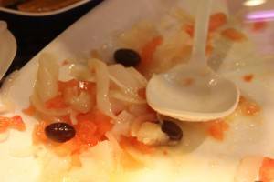 And esqueixada ("eskeshada"), a beautifu dish made with salt cod, onions tomatoes and olives